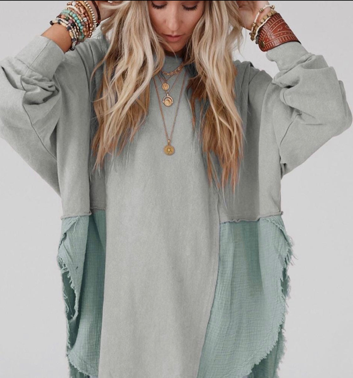 Splicing raw hem over size blouse